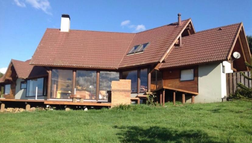 Foto 42 de A402 Parcela con hermosa casa y vista panorámica en sector Altamira - Villarrica