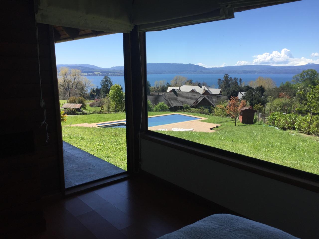 Foto 3 de A402 Parcela con hermosa casa y vista panorámica en sector Altamira - Villarrica