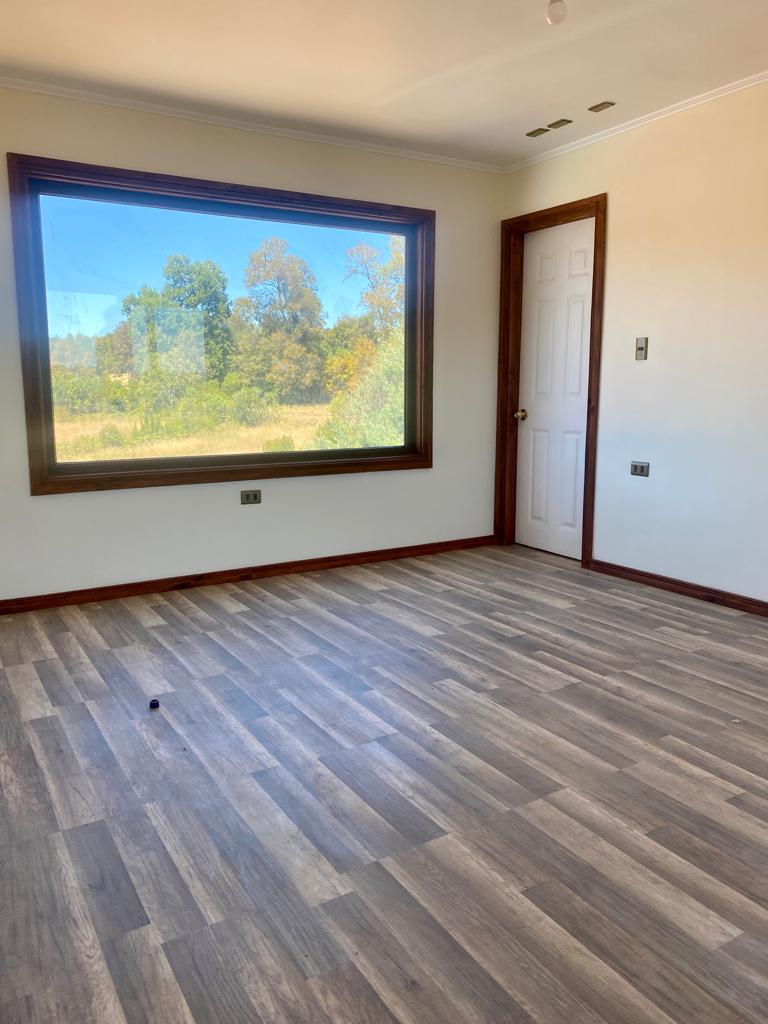 Foto 6 de A310 Parcela con hemosa casa en Lomas de Villarrica